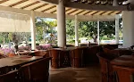 B Nayar Beach Club & Restaurant Exceptional dining with reasonable prices. Enjoy your favorite coastal dishes and famous piña coladas with exclusive beach club access.
